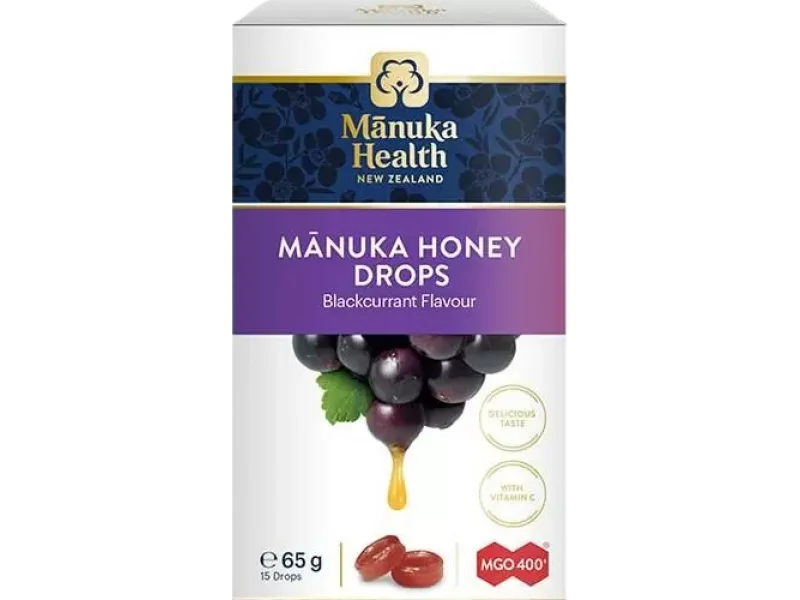 Manuka Health z miodem manuka MGO 400+ i witaminą C, smak czarnej porzeczki, cukierki, 65 g